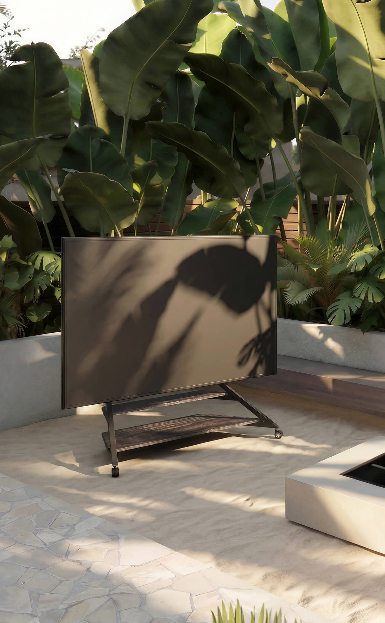 Mobile crop of an Eiffel V2 FT100 outdoor TV stand in a leafy patio setting