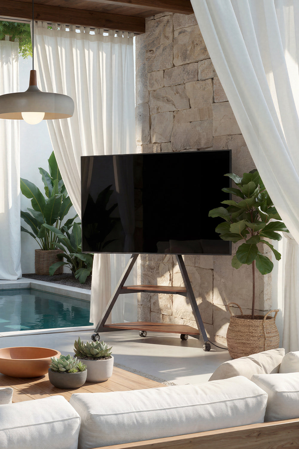 Eiffel FT88 tripod TV stand in a bright garden room beside indoor planting
