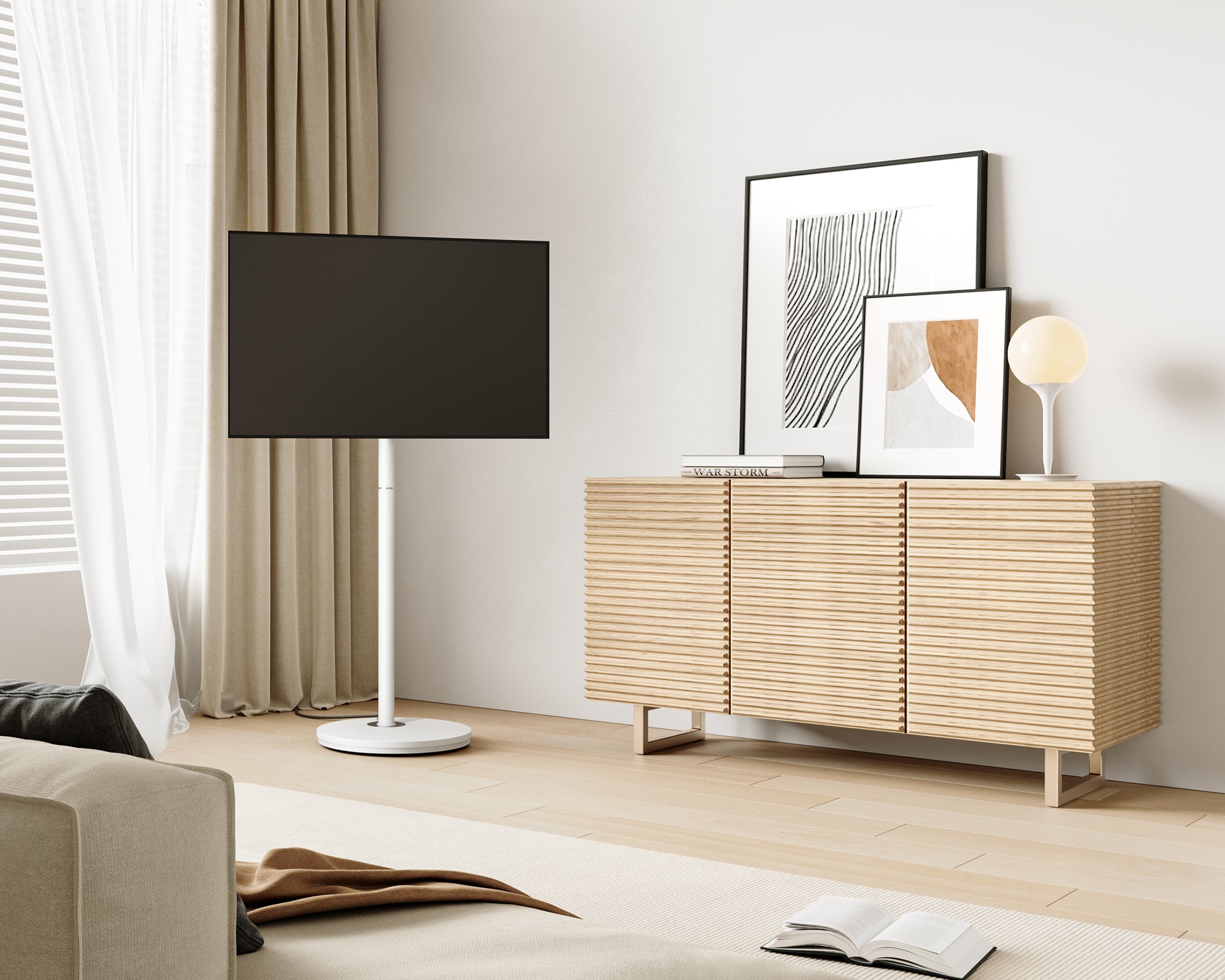 White portable floor TV stand with wheels in the living room