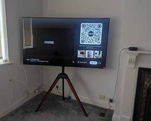 corner tv stand for 65 inch tv by the fireplace