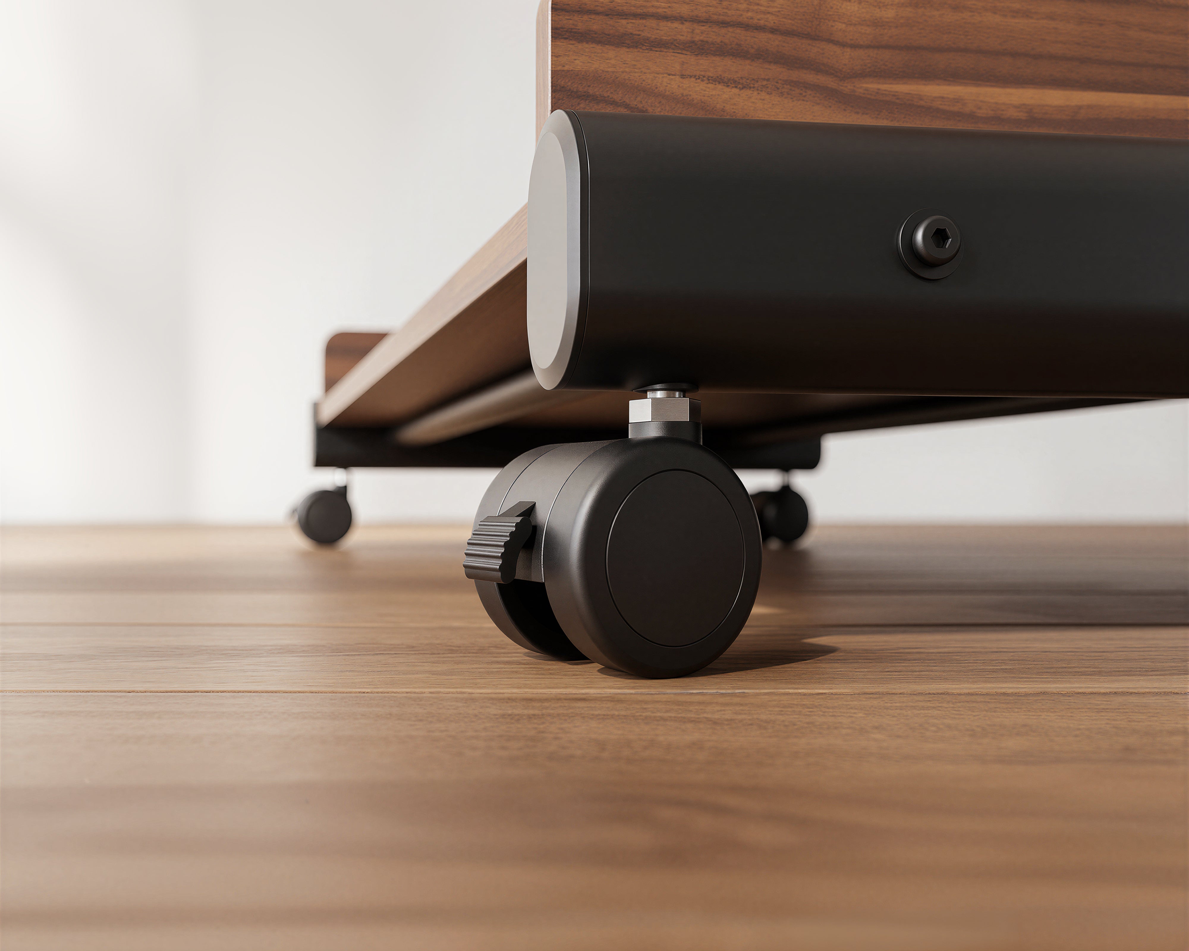 Locking castor close-up on the black FITUEYES K TC85 S2 mobile TV stand
