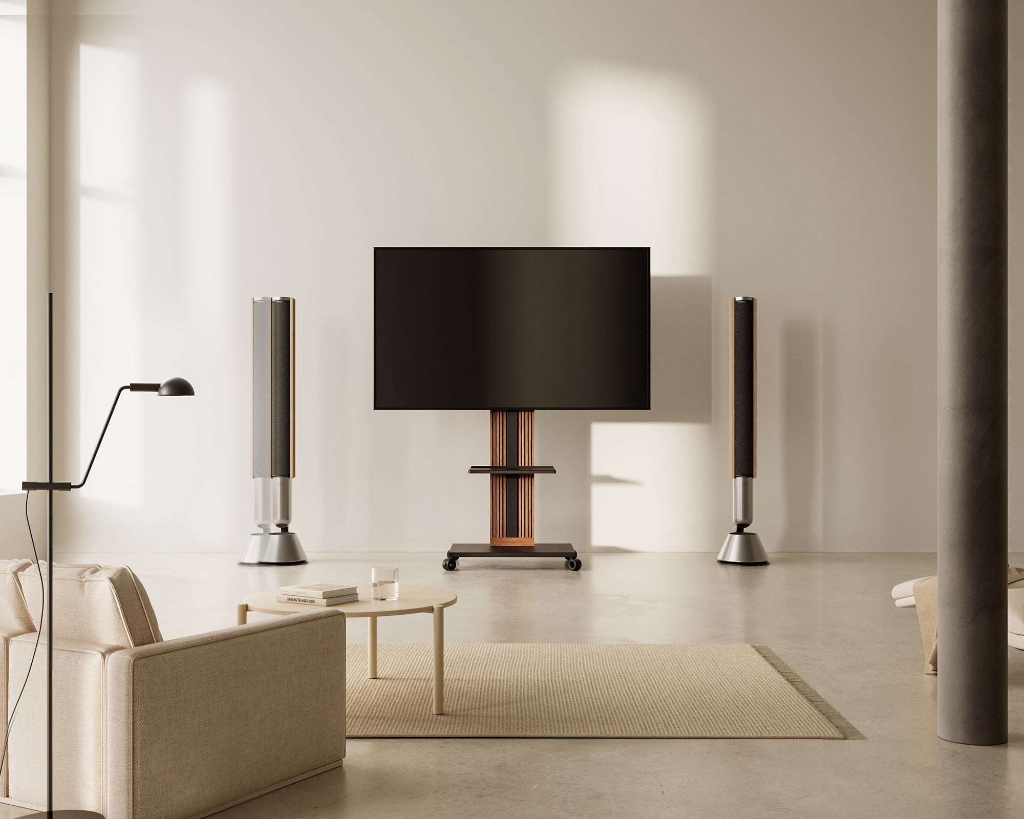Walnut Zen FT65 floor-standing TV mount set between speakers in a modern lounge